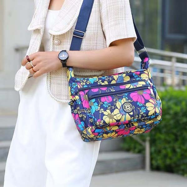Woman’s Sling Carry Shoulder Bag